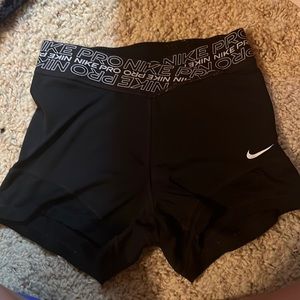 Nike pros, black, little peeling on the band inside, worn a couple times, S
